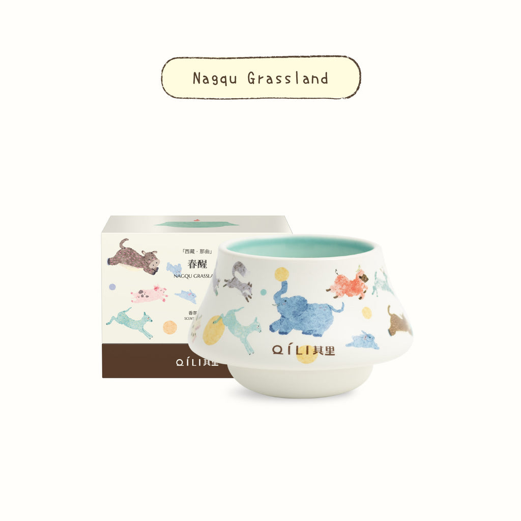 Scented candle in illustrated ceramic cup, label: Nagqu Grassland