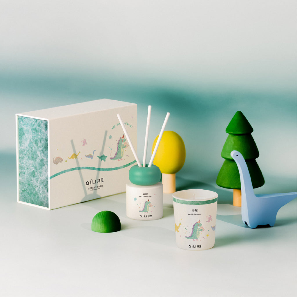 Dinosaur scent diffuser set with reed sticks, small jar, and decorative dinosaur