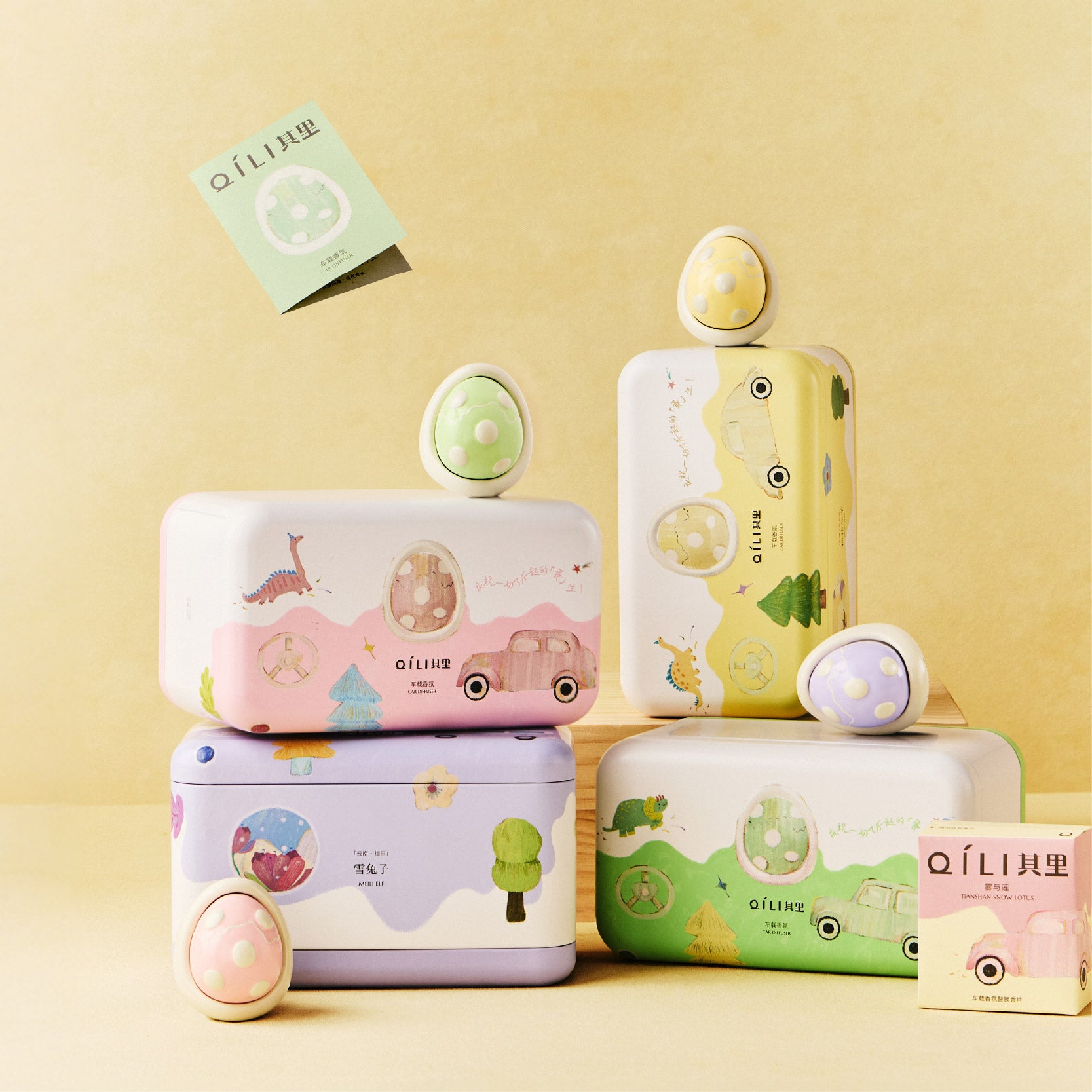 Car diffuser set with multiple egg-shaped scent pods and matching product boxes