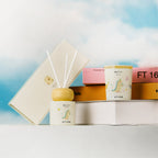 Dinosaur scent set with reed diffuser and two boxed candles, yellow lid jar